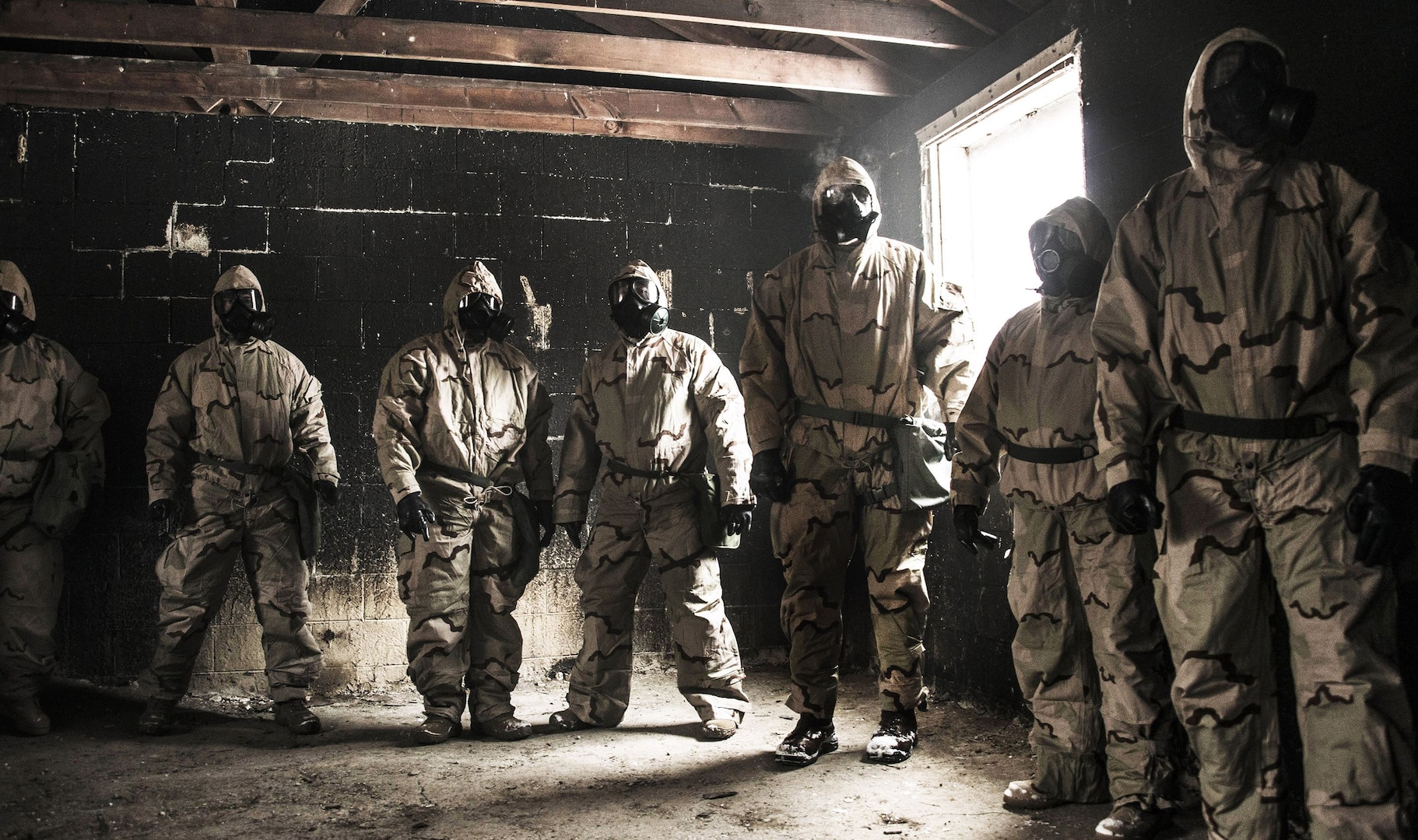 Members of DLA’s rapid deployment Red Team brave the gas chamber to conduct a functions test on personal protective equipment during nuclear, biological and chemical training at Camp Atterbury, Indiana, Jan. 16-20.