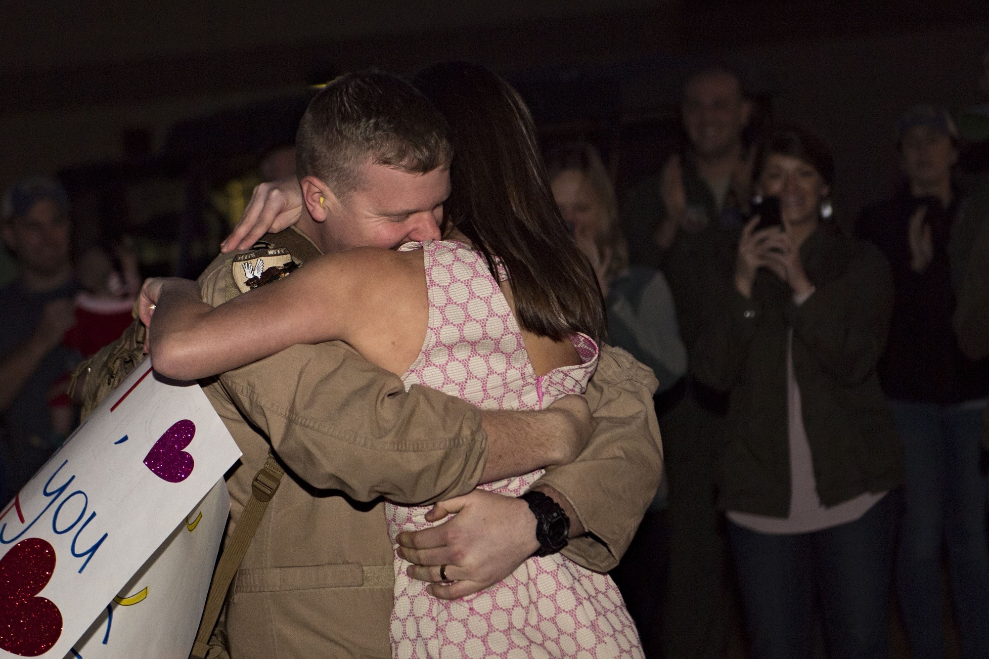Capt. Ryan Siebert, 74th Fighter Squadron A-10C Thunderbolt II pilot, embraces his spouse, Sarah, during a redeployment, Jan. 23, 2018, at Moody Air Force Base, Ga. Airmen from the 74th Fighter Squadron and 23d Maintenance Group returned home after a seven-month deployment in support of Operation Inherent Resolve. (U.S. Air Force photo by Senior Airman Daniel Snider)