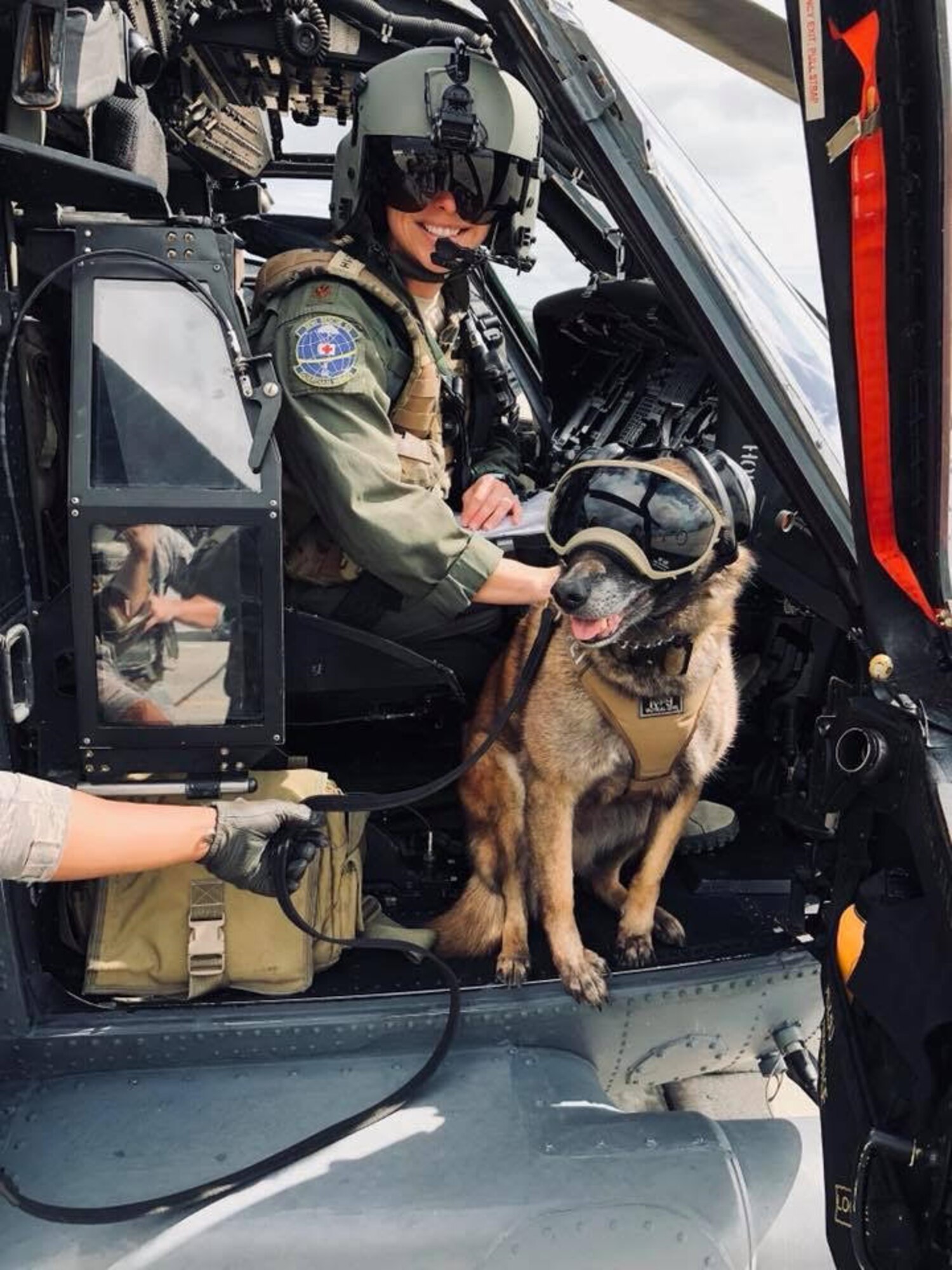 Citizen Airmen Reservists Maj. Mary Minshew, HH-60G Pave Hawk pilot, and a team of Citizen Airmen Reserve aircrew from the 920th Rescue Wing's 301st Rescue Squadron, train with Beta the Belgium malinois,