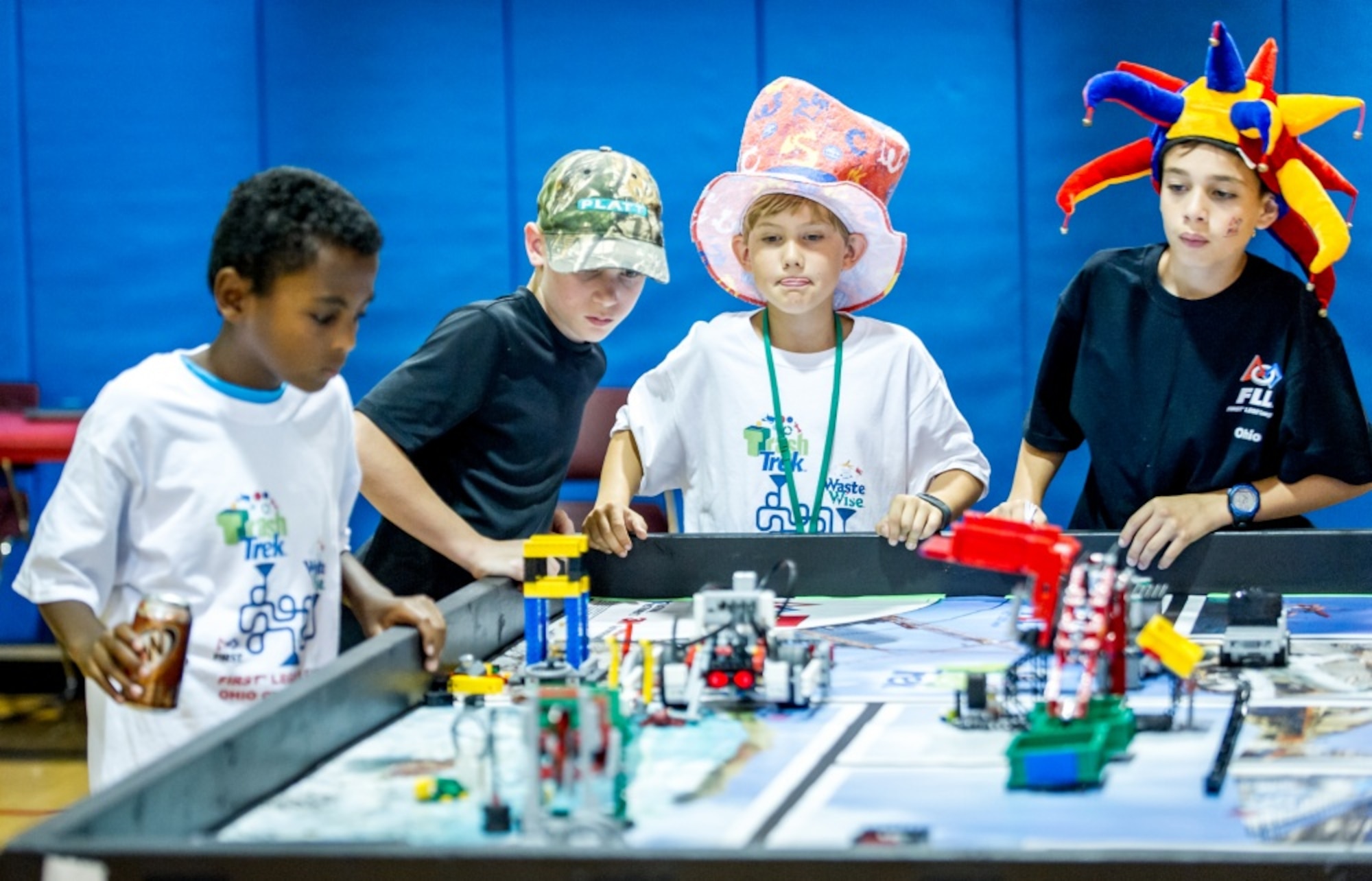 Left to right, Samson Scheie, 12, Brendan Marx, 12 Samuel Snowden, 9, and Joeseph Yoeder, 11, [cq] test out their robot before competing in a First Lego League tournament at DoD's Starbase building near the Air Force Research Laboratory at Wright Patterson Air Force Base in Dayton, Ohio, Jul 22, 2016. The Air Force STEM outreach offices work with the First Lego League, which teaches young students how to build and program robots made of Legos, to not only support STEM education, but also to make young technical minds aware of opportunities to pursue science in the U.S. Air Force.