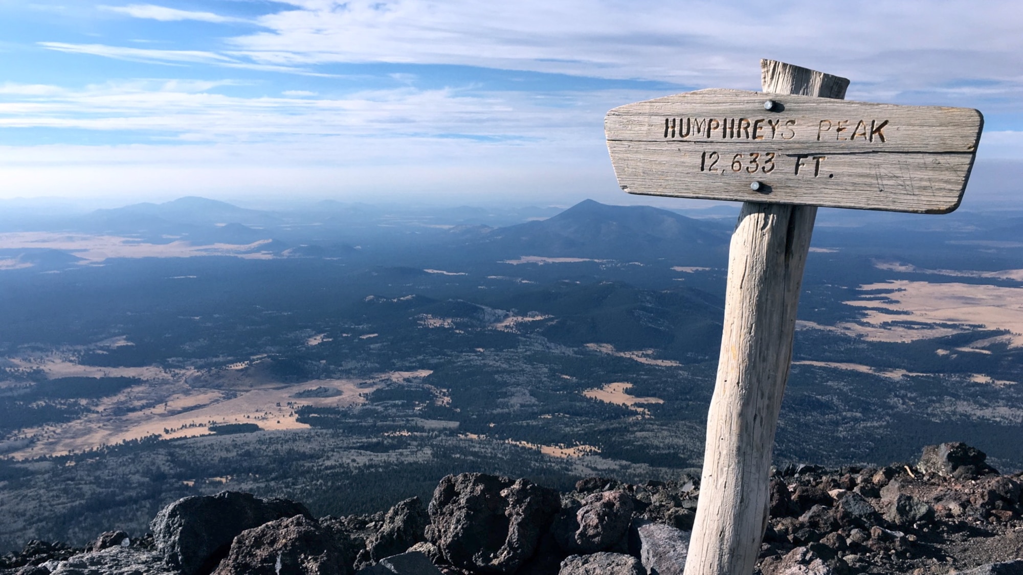 An elevation sign stands atop the summit of Humphreys Peak north of Flagstaff, Ariz., Dec. 16, 2017. Humphreys Peak is Arizona’s highest point and the tallest mountain in the San Francisco Peaks located north of Flagstaff. (U.S. Air Force photo/Senior Airman Ridge Shan)