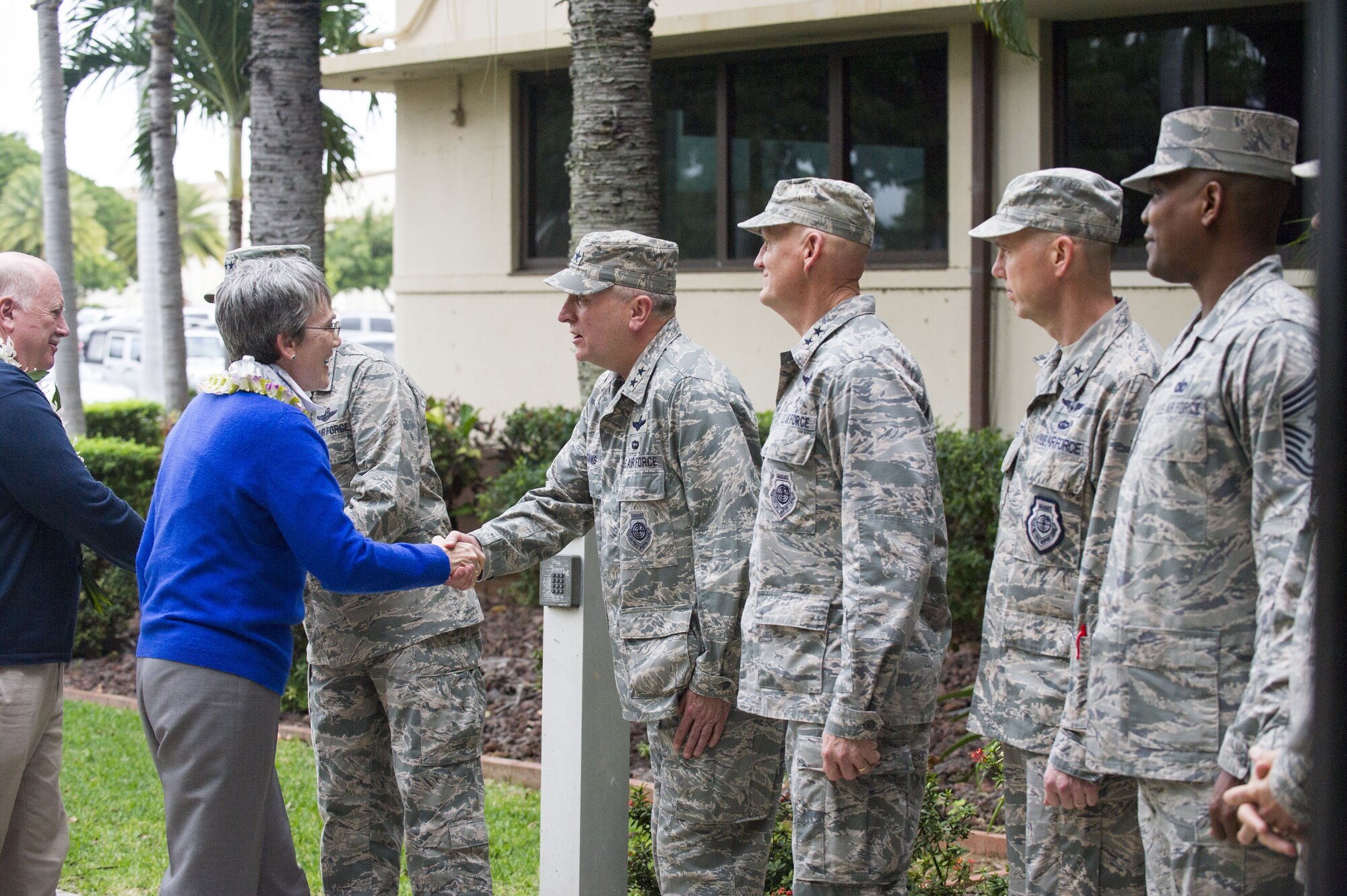 Secretary of the Air Force Heather Wilson and her husband, Jay Hone, greet members of Pacific Air Forces (PACAF) leadership upon their arrival to the PACAF headquarters building at Joint Base Pearl Harbor-Hickam, Hawaii Jan. 23, 2018.