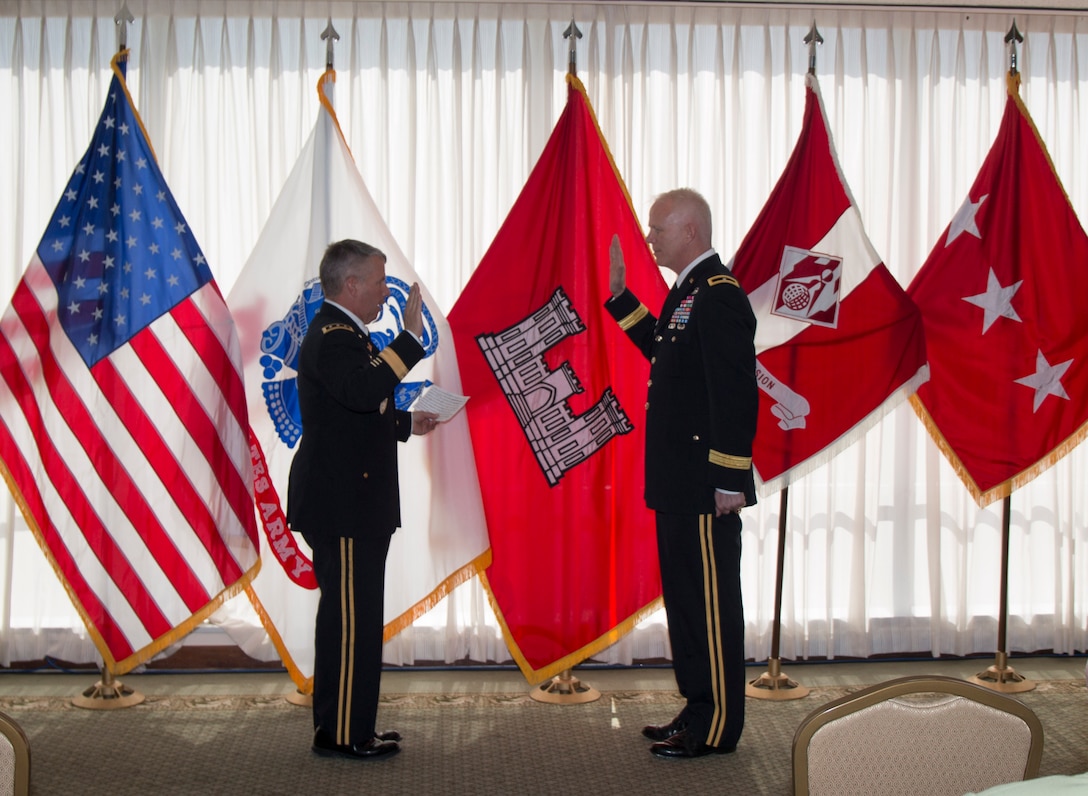 Lt. Gen. Todd T. Semonite (left), Commanding general of the U.S. Army Corps of Engineers administers the Army Officer’s Oath of Office to Brig. Gen. Paul E. Owen in a ceremony today in Dallas, Texas.