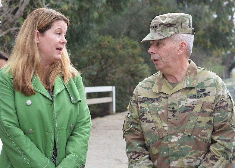 Carol Armstrong, executive officer to the Los Angeles Deputy Mayor of City Services, left, and Lt. Gen. Todd Semonite, commanding general of the U.S. Army Corps of Engineers, right, discuss the Los Angeles River Ecosystem Restoration project during a Jan. 19 site visit.