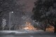 Base residents walk through the snow covered streets during the first snow storm of the year, Jan. 22, 2018, at Yokota Air Base, Japan.