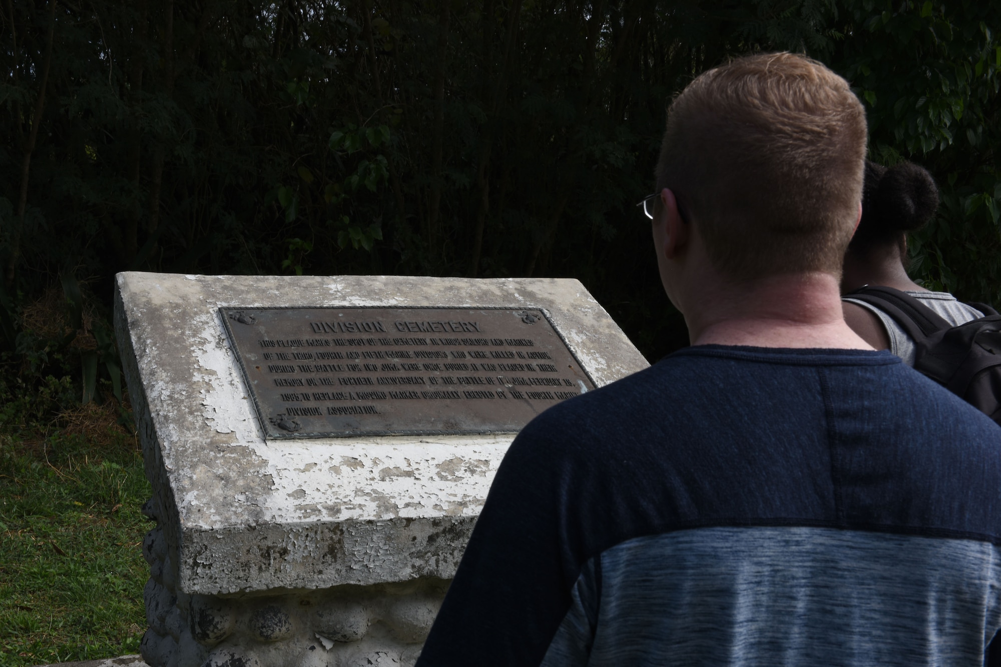 Staff Sgt. Benjamin Baughman, a loadmaster with the 36th Airlift Squadron, reflects on one of the memorials Jan. 24, 2017, on the island of Iwo To, Japan.