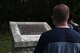 Staff Sgt. Benjamin Baughman, a loadmaster with the 36th Airlift Squadron, reflects on one of the memorials Jan. 24, 2017, on the island of Iwo To, Japan.
