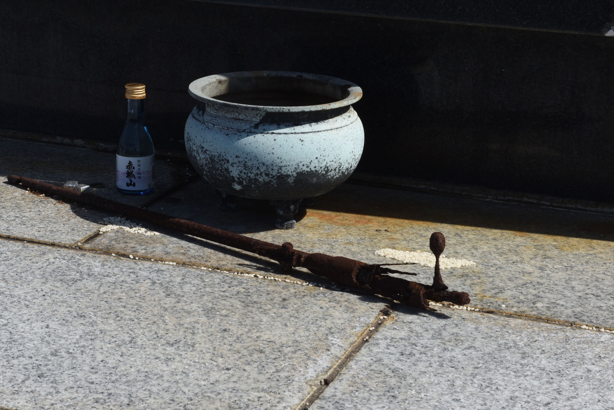 Offerings rest in front of the Japanese memorial atop Mount Suribachi on the island of Iwo To, Japan.