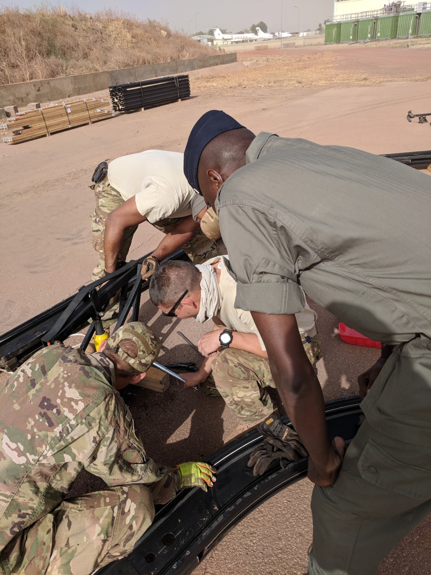 Airmen from the 635th Material Maintenance Squadron, Holloman Air Force Base, New Mexico, deployed to N'Djamena on Jan. 7, 2018 to assist the Chadian Air Force to erect aircraft maintenance shelters and training for their critical aircraft. The effort was initiated due to a large-scale wind storm last summer that destroyed many aircraft and maintenance shelters located in the main airfield in N'Djamena. (Courtesy Photo)