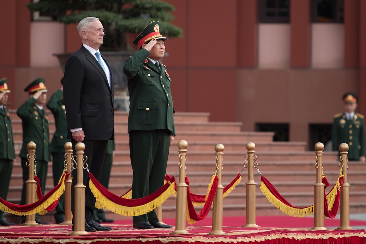 U.S. and Vietnamese defense leaders honor troops in Hanoi, Vietnam.