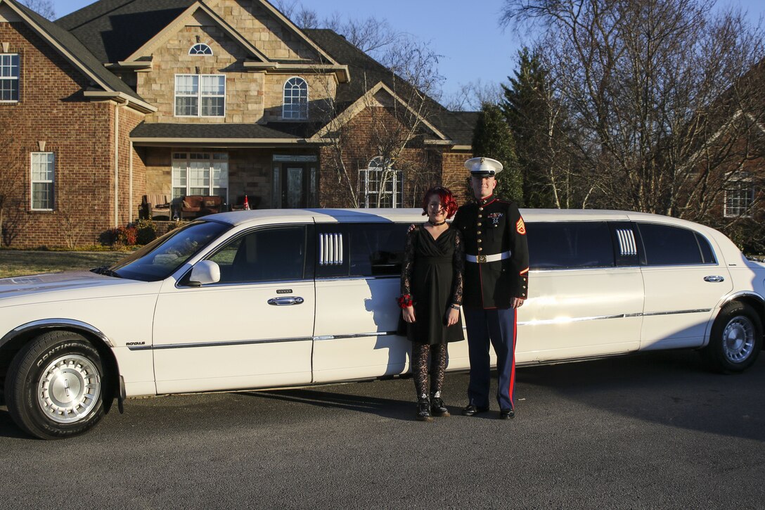 U.S. Marine Staff Sgt. Brian D. Raney, the station commander for Recruiting Substation Murfreesboro, stands with Raven Campbell outside of their limo for a father-daughter dance at St. Mark’s United Methodist Church, Murfreesboro, Tennessee, on Jan. 20, 2017. Raven did not have a father to go with but dreamed of attending the dance with a Marine. Raney stepped in to make her dreams come true. Raney is a recruiter currently stationed with Recruiting Station Nashville, 6th Marine Corps District, Eastern Recruiting Region, Marine Corps Recruiting Command. (U.S. Marines photo by Sgt. Mandaline Hatch)