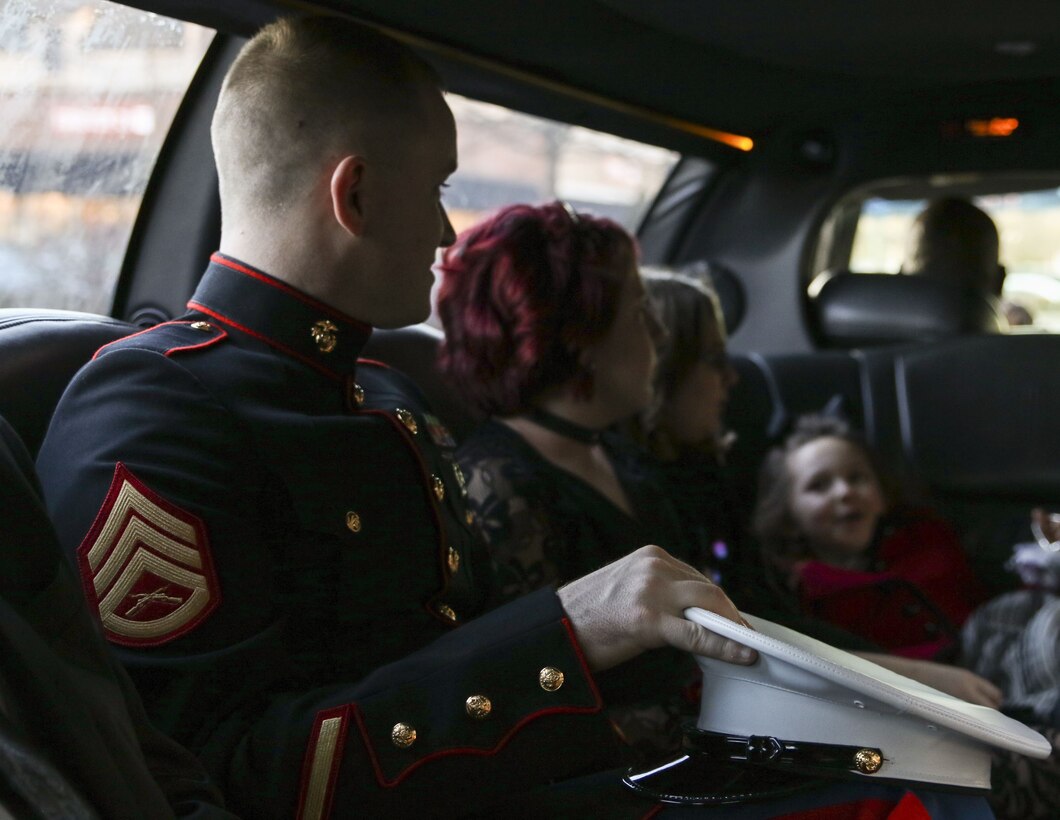 U.S. Marine Staff Sgt. Brian D. Raney, the station commander for Recruiting Substation Murfreesboro, rides in a limo with Girl Scouts to a father-daughter dance at St. Mark’s United Methodist Church, Murfreesboro, Tennessee, on Jan. 20, 2017. Raney stepped in as the father figure for one of the Girl Scouts, Raven Campbell. Raney is a recruiter currently stationed with Recruiting Station Nashville, 6th Marine Corps District, Eastern Recruiting Region, Marine Corps Recruiting Command. (U.S. Marines photo by Sgt. Mandaline Hatch)