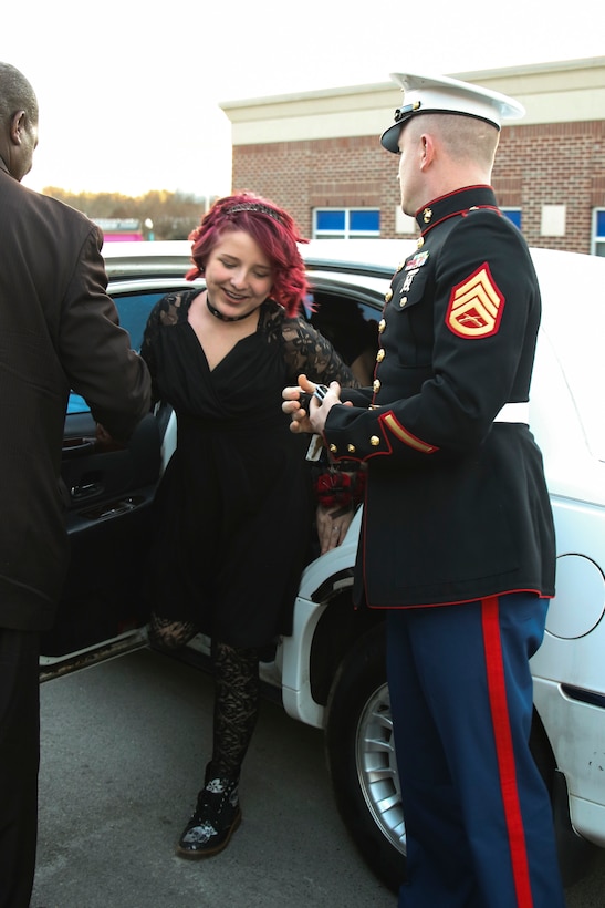 U.S. Marine Staff Sgt. Brian D. Raney waits for Raven Campbell to exit the limo at St. Mark’s United Methodist Church, Murfreesboro, Tennessee, on Jan. 20, 2018. Raney and the community came together to make the father-daughter dance a special night for Raven. Raney is a recruiter currently stationed with Recruiting Station Nashville, 6th Marine Corps District, Eastern Recruiting Region, Marine Corps Recruiting Command. (U.S. Marines photo by Sgt. Mandaline Hatch)