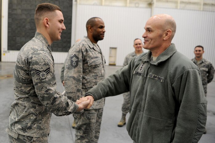 Gen. Carlton D. Everhart II, commander of Air Mobility Command, visited Joint Base Charleston January 16 through 19 to address and learn from the Airmen of the 628th Air Base Wing, 437th Airlift Wing and their joint mission partners. During the visit, he gave coins to star performers, posed for group photos and presented the 628th Air Base Wing the Outstanding Unit Award and 437th Airlift Wing the Meritorious Service Award.