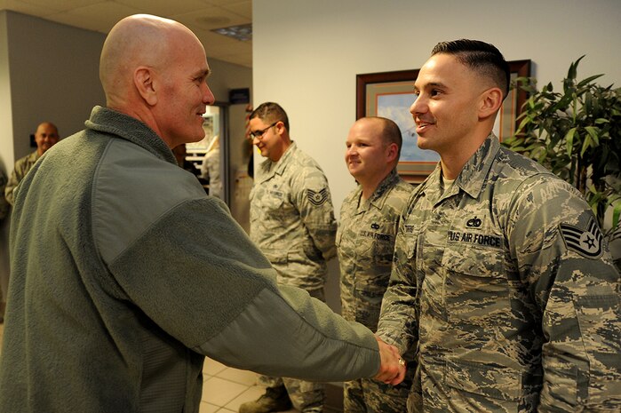 Gen. Carlton D. Everhart II, commander of Air Mobility Command, visited Joint Base Charleston January 16 through 19 to address and learn from the Airmen of the 628th Air Base Wing, 437th Airlift Wing and their joint mission partners. During the visit, he gave coins to star performers, posed for group photos and presented the 628th Air Base Wing the Outstanding Unit Award and 437th Airlift Wing the Meritorious Service Award.