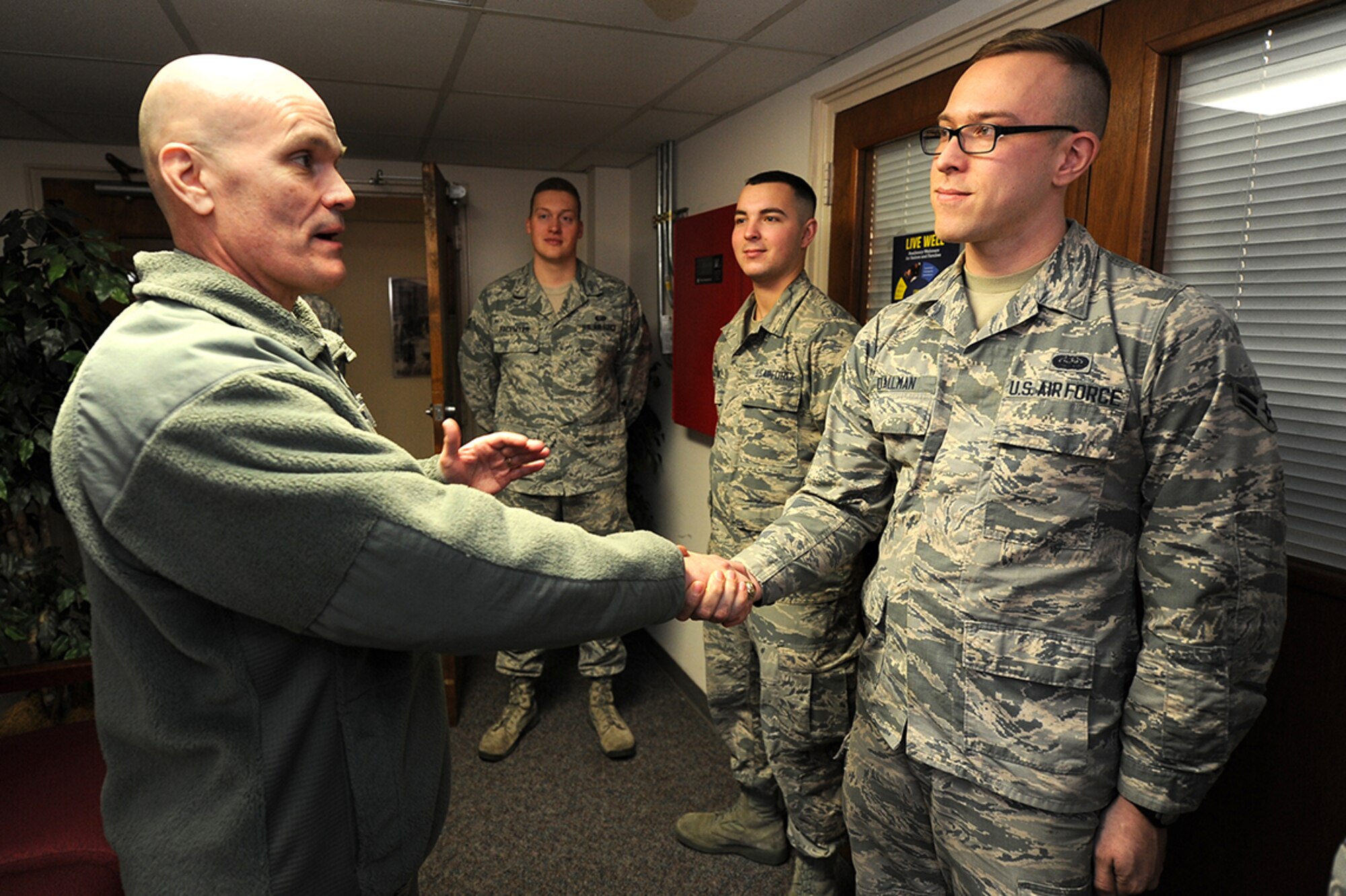 Gen. Carlton D. Everhart II, commander of Air Mobility Command, visited Joint Base Charleston January 16 through 19 to address and learn from the Airmen of the 628th Air Base Wing, 437th Airlift Wing and their joint mission partners. During the visit, he gave coins to star performers, posed for group photos and presented the 628th Air Base Wing the Outstanding Unit Award and 437th Airlift Wing the Meritorious Service Award.