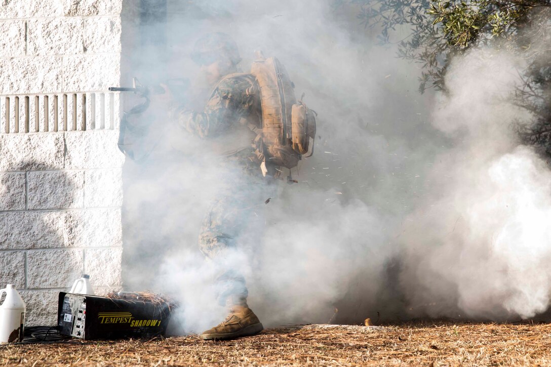A corpsman with 2nd Medical Battalion, 2nd Marine Logistics Group, provides security during a Tactical Combat Casualty Care training exercise at Camp Lejeune, N.C. Jan. 22, 2018. TCCC is designed to help corpsmen practice basic medical techniques while in a stressful environment. The corpsmen are evaluated with simulated battlefield scenarios overseen by instructors. (U.S. Marine Corps photo by Pfc. Nicholas Guevara)