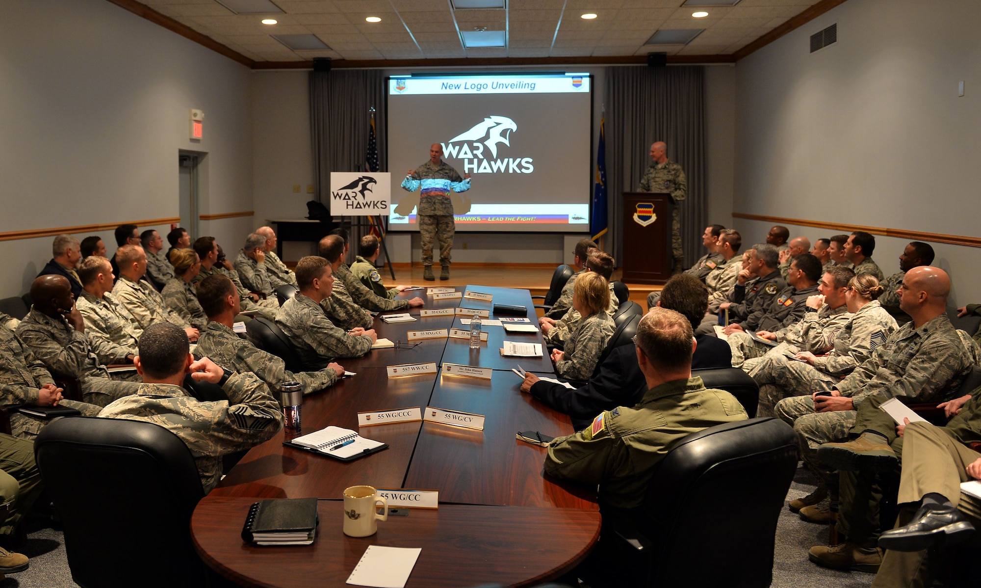 The 55th Wing leadership team looks on as Col. Michael Manion, 55th Wing commander, officially unveils the War
Hawks during a staff meeting at Offutt Air Force Base, Neb. on Jan. 25.