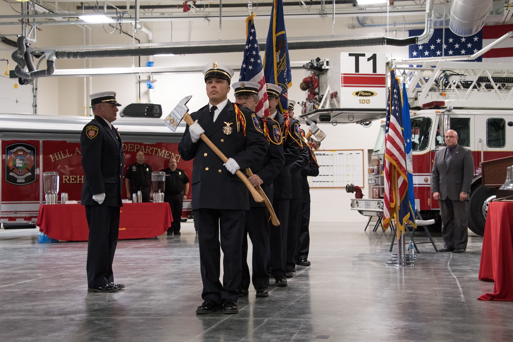 Photo of the firefighters during a ceremony to open Hill's new flight line fire station.