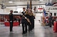 Photo of the firefighters during a ceremony to open Hill's new flight line fire station.