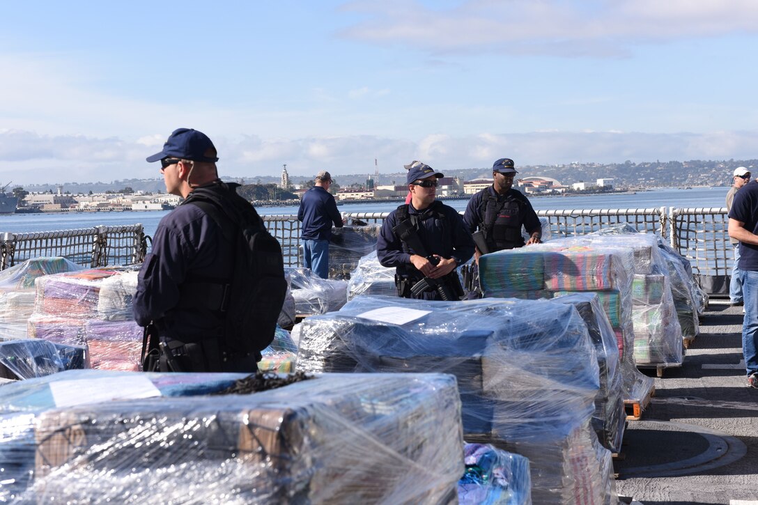 Coast Guard Cutter Stratton boarding team members guard 47,000 pounds of seized cocaine