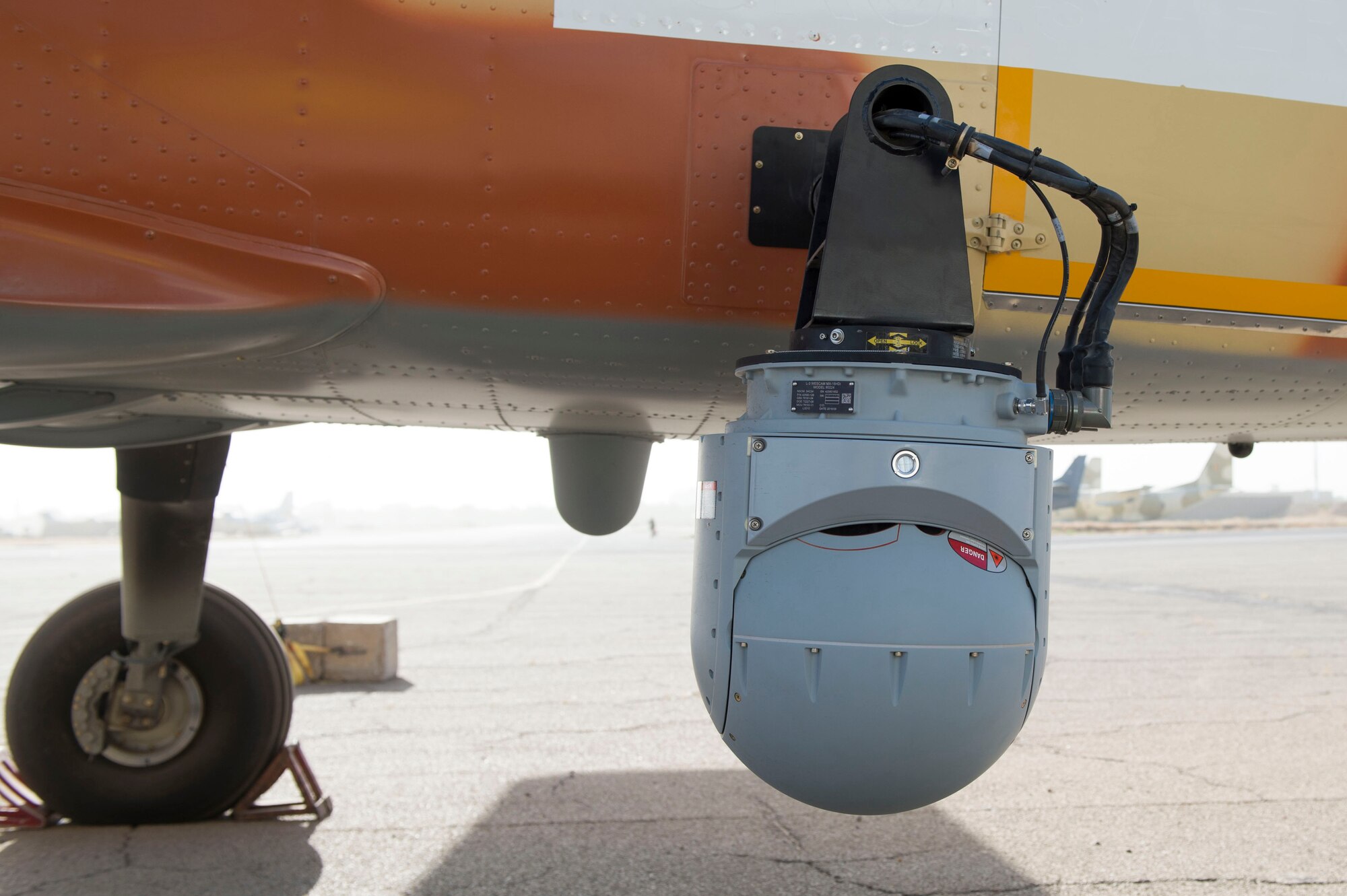 An MX-15 camera is mounted on a C-208 aircraft parked at Adjikossei Air Base, N'Djamena, Chad, January 17, 2018.