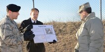 Capt. Michael Olson, with the 72nd Security Forces Squadron and Brad Beam, with the 72nd Civil Engineering Directorate, brief Air Force Sustainment Center Commander Lt. Gen. Lee K. Levy II on the requirements, communication plan and future needs of the newly-opened Pegasus Gate located on South Air Depot Blvd. They also provided an overview of traffic flow changes due to gate construction