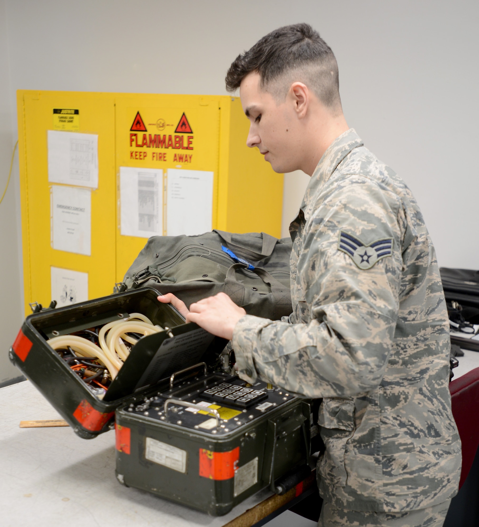 U.S. Air Force Senior Airman Cayce Kaminski, 20th Component Maintenance Squadron (CMS) electrical and environmental systems specialist, performs accountability at Shaw Air Force Base, S.C., Jan. 22, 2018.