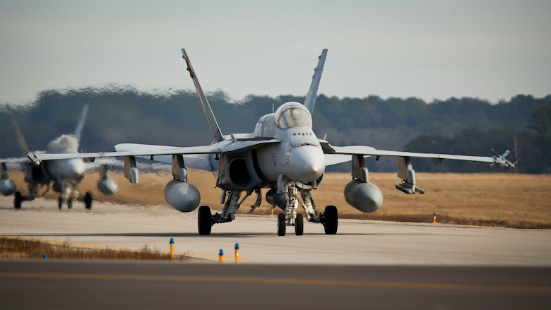 F/A-18C Hornets taxi down the flight line aboard Marine Corps Air Station Beaufort, Jan. 22.