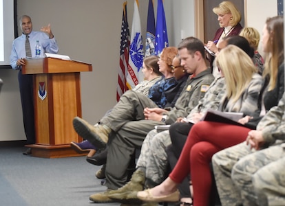Toby Housey, left, 628th Air Base Wing equal opportunity office director, shares quarterly data gathered by the Community Action Team here Jan. 26, 2018. The Community Action Team uses these meetings as an opportunity to inform base leadership on the needs and trends of military members and their families stationed at Joint Base Charleston.