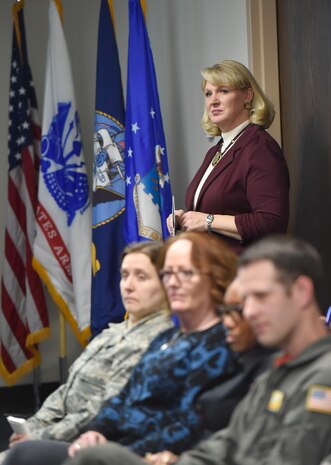 Michelle McMeekin, Community Support Coordinator at Joint Base Charleston, S.C., shares quarterly data gathered by the Community Action Team to joint base leadership here Jan. 26, 2018. The Community Action Team uses these meetings as an opportunity to inform base leadership on the needs and trends of military members and their families stationed at Joint Base Charleston.