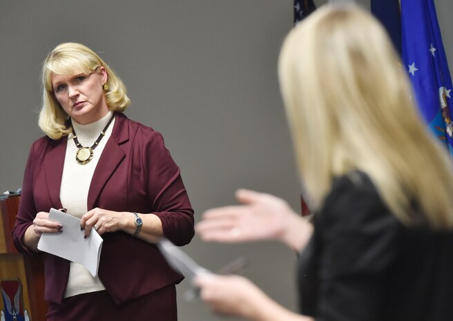 Michelle McMeekin, left, Community Support Coordinator at Joint Base Charleston, S.C., discusses joint base trends identified by the installation’s Community Action Team with unit representatives and leadership here Jan. 26, 2018. The Community Action Team uses these meetings as an opportunity to inform base leadership on the needs and trends of military members and their families stationed at Joint Base Charleston.