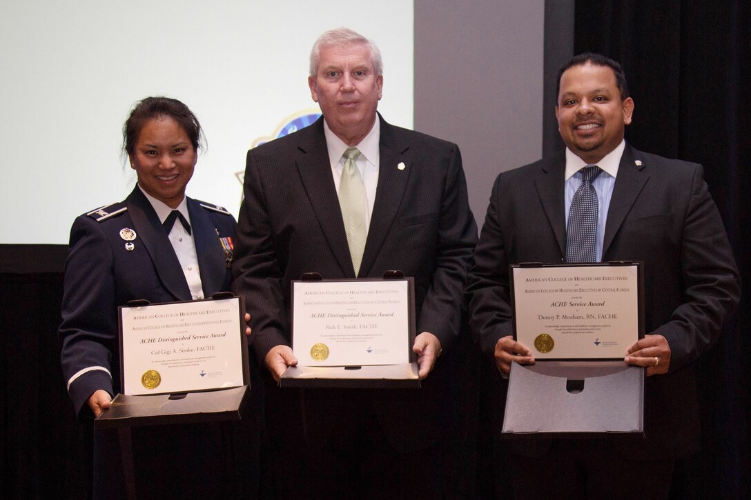 Colonel Gigi Simko, 45th Medical Group commander, was recognized
on Jan. 20 with the ACHE Distinguished Service Award.