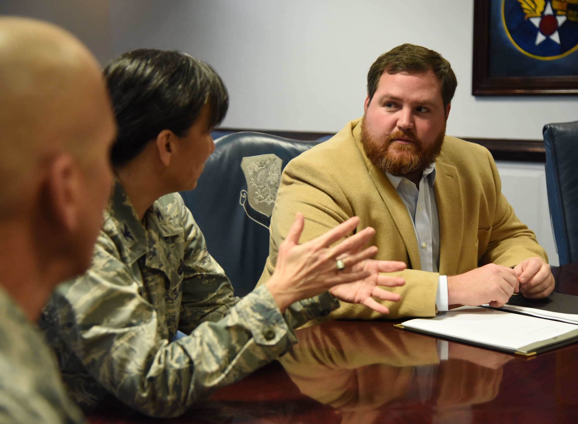 Col. Debra Lovette, 81st Training Wing commander, briefs David Allen, legislative assistant for Congressman Steven Palazzo, on Keesler training capabilities during an 81st Training Wing mission brief at the headquarters building Jan. 26, 2018, on Keesler Air Force Base, Mississippi. Allen visited Keesler to learn more about the base and on-going construction projects that impact the local community, like the Division Street Gate which will begin construction this summer. (U.S. Air Force photo by Kemberly Groue)