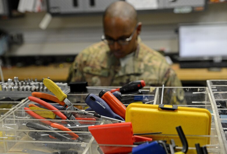 Tech. Sgt. Richard Smith, 455th Expeditionary Medical Operation Squadron clinical engineering NCOIC, repairs medical equipment Jan. 15, 2018 at Craig Joint Theater Hospital in Bagram Airfield, Afghanistan.