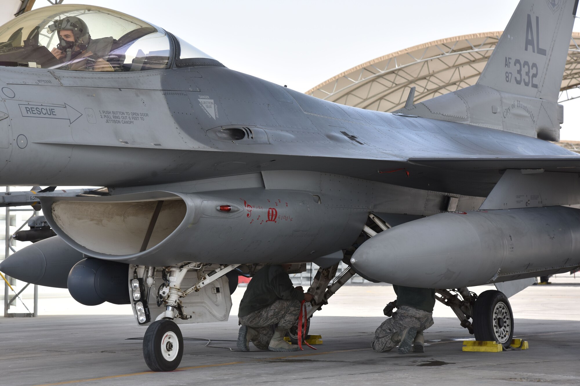 A 100th Expeditionary Fighter Squadron pilot and 407th Expeditionary Maintenance Squadron crewmembers prepare for takeoff from an undisclosed in Southwest Asia, Jan. 18, 2018. This is the last mission for their rotation. (U.S. Air Force photo by Staff Sgt. Joshua Edwards/Released)