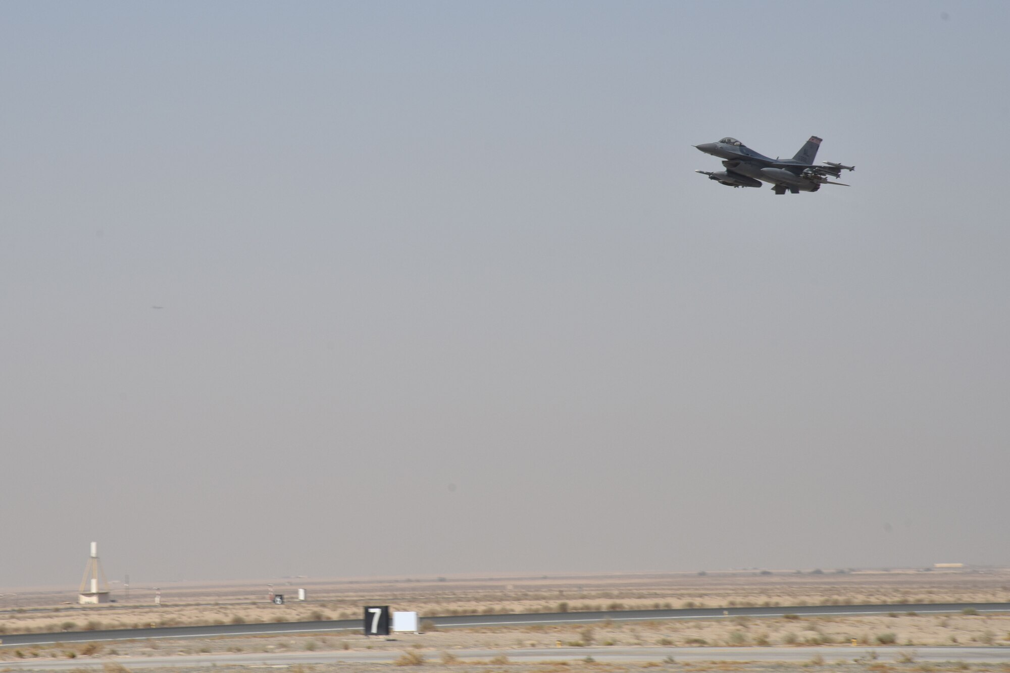 An F-16 Fighting Falcon takes off from an undisclosed location in Southwest Asia, Jan. 18, 2018. This was the last mission this pilot and aircraft performed while on their current deployment. (U.S. Air Force photo by Staff Sgt. Joshua Edwards/Released)