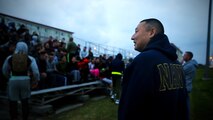 Lt. Cmdr. Yoon Choi, the regimental chaplain for Combat Logistics Regiment 35, waits to address a group of Marines and Sailors before the Kinser Challenge at Roberts Field on Camp Kinser, Okinawa, Japan, Jan. 26, 2018. The Kinser Challenge is an event organized by the 3rd MLG chaplain’s office and hosted by Combat Logistics Regiment 35, to promote camaraderie, physical exercise, mental aptitude and spiritual wellness. (U.S. Marine Corps photo by Cpl. Joshua Pinkney)
