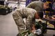 U.S. Airmen assigned to the 86th Logistics Readiness Group check duffel bags to ensure all of their individual protection equipment is accounted for on Ramstein Air Base, Germany Jan. 26, 2018. The 86th LRG began their mobility exercise in early morning at 5 a.m. and ended at 5 p.m.