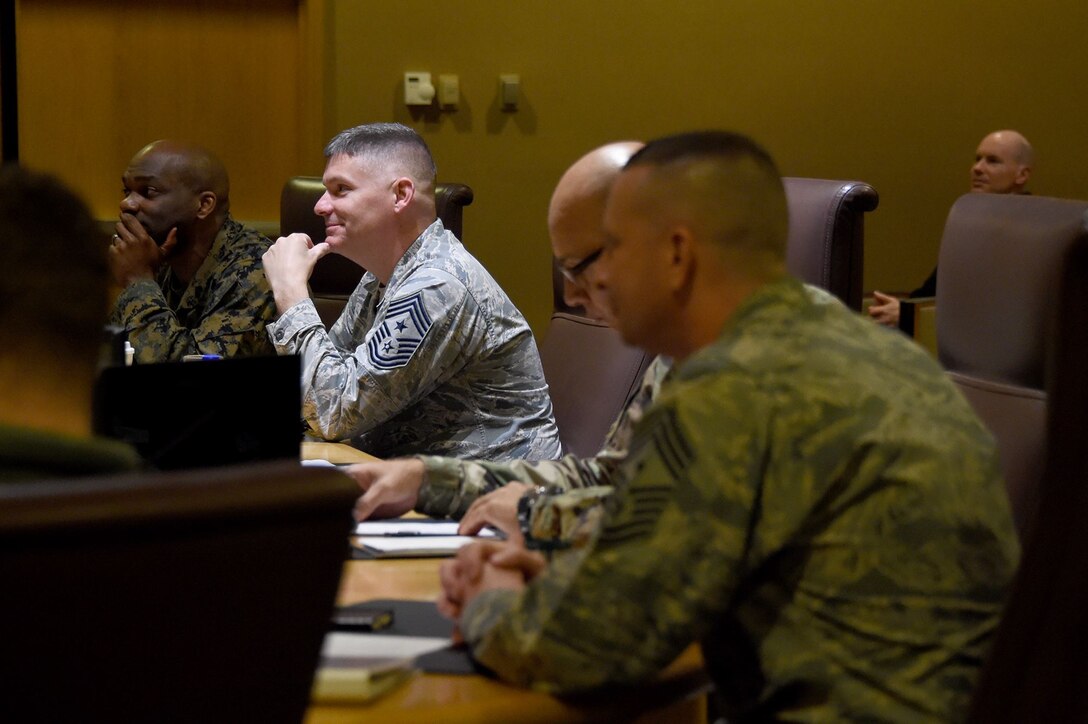U.S. Air Force Chief Master Sgt. Patrick McMahon (second from left), senior enlisted leader of U.S. Strategic Command (USSTRATCOM), and other senior enlisted leaders listen to a briefing during the inaugural non-commissioned officer (NCO) and petty officer (PO) joint professional development seminar at Offutt Air Force Base, Neb., Jan. 25, 2018. During the two-day course, NCOs and POs assigned to USSTRATCOM and the 55th Wing discussed leadership techniques with senior enlisted leaders and officers through a series of discussion panels and briefings. This pilot course was developed by USSTRATCOM’s senior enlisted leaders to enhance the effectiveness of soldiers, sailors, airmen and Marines at the E-5 and E-6 level through joint professional military education.