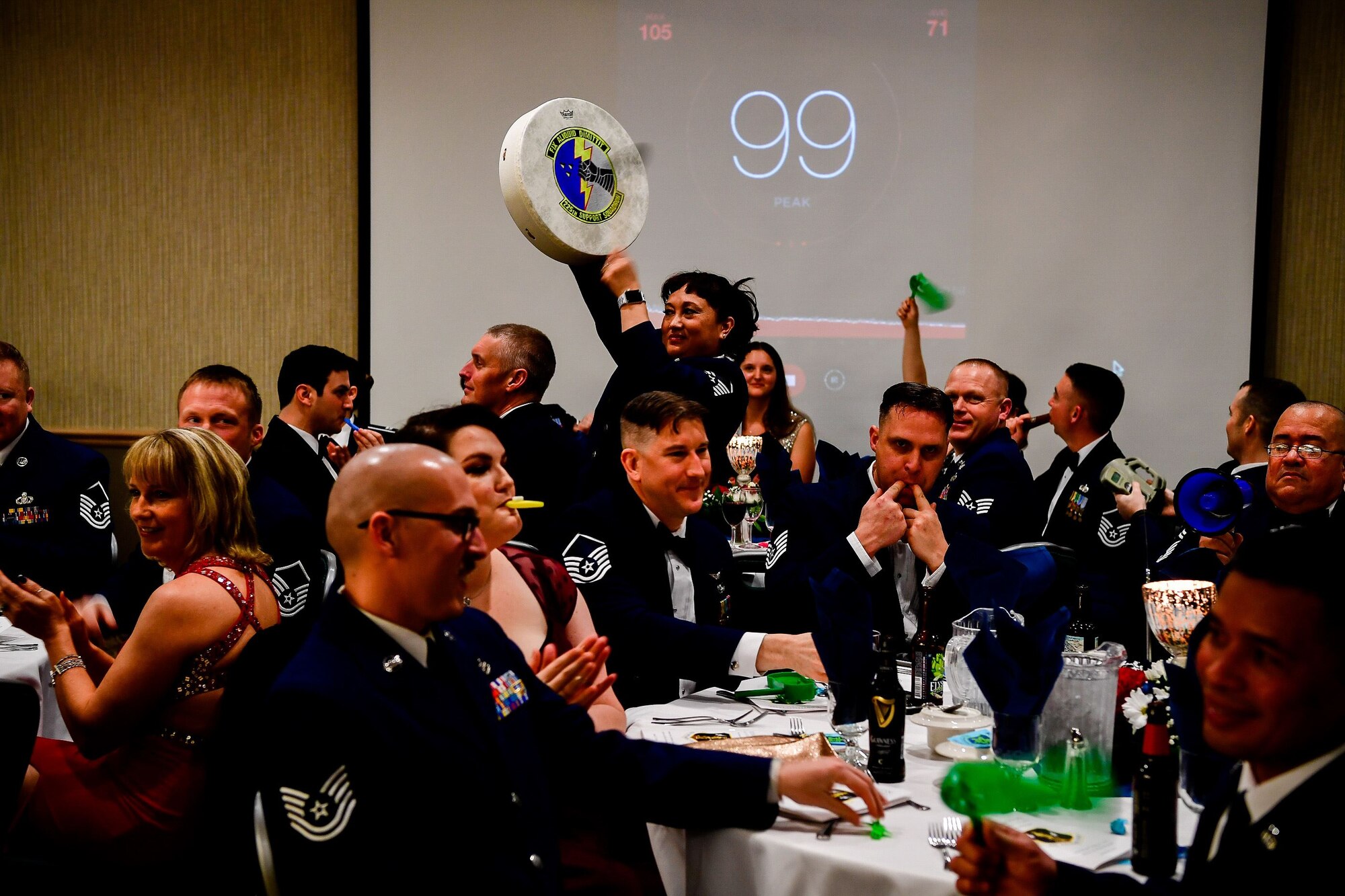 Members of the Western Air Defense Sector cheer for thier award nominees during the Washington Air National Guard's 9th Annual Awards Banquet held Jan. 27, 2018, at the American Lake Conference Center on Joint Base Lewis-McChord, Washington.  (U.S. Air National Guard Photo by Tech. Sgt. Timothy Chacon)