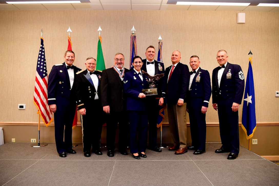 The Washington Air National Guard Squadron of the Year is awarded to the 141st Security Forces Squadron, 141st Air Refueling Wing.  Members of the 141st SFS pose for a picture during the Washington Air National Guard's 9th Annual Awards Banquet held at the American Lake Conference Center on Joint Base Lewis-McChord, Washington, Jan. 27, 2018.  (U.S. Air National Guard Photo by Tech. Sgt. Timothy Chacon)