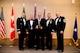 Randy Toulou, a unit readiness training coordinator with the 141st Security Forces Squadron, 141st Air Refueling Wing, is presented with the Civilian of the Year trophy at the Washington Air National Guard’s 9th Annual Awards Banquet held at the American Lake Conference Center on Joint Base Lewis-McChord, Washington, Jan. 27, 2018. Toulou was awarded the trophy for his outstanding contributions to the Washington Air National Guard over the last year.  Pictured from left to right are: Gen. Robin Rand, Air Force Global Strike Command and Air Forces Strategic-Air, U.S. Strategic Command commander; Maj. Gen. Bret Daugherty, Adjutant General of the Washington National Guard, Toulou, Brig. Gen. Jeremy Horn, commander of the Washington Air National Guard, and Chief Master Sgt. Max Tidwell, Washington Air National Guard command chief. (U.S. Air National Guard photo by Tech. Sgt. Timothy Chacon)