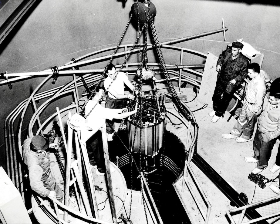 Undated - Technicians set the core structure for the Army Package Power Reactor. At this stage, the reactor plant was 96 percent complete.(Photo courtesy of the Office of History)