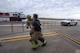 Firefighters from the 23d Civil Engineer Squadron (CES) carry a ladder during extraction training, Jan. 25, 2018, at Moody Air Force Base, Ga. Firefighters from the 23d CES conducted A-10C Thunderbolt II extraction training to practice extinguishing an aircraft fire and quickly rescuing a pilot from an A-10. The 23d CES holds the extraction training twice annually and are evaluated on the amount of time it takes them to rescue a pilot from the cockpit. (U.S. Air Force photo by Airman Eugene Oliver)