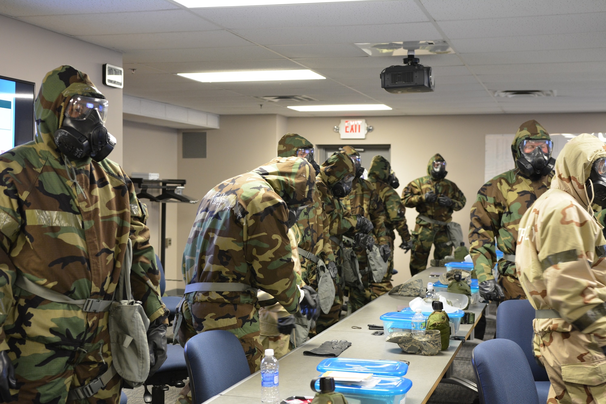 Members complete weapons qualifications in preparation for deployment at the Combat Arms Training and Maintenance facility at the 88th Security Forces Squadron on Wright-Patterson Air Force Base. (Air Force/contributed photo)