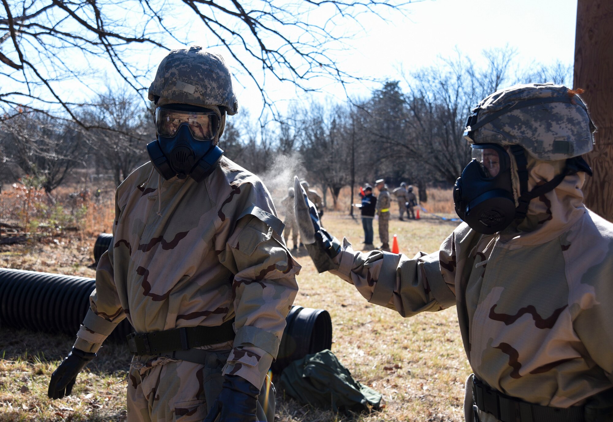 Airmen apply charcoal pad