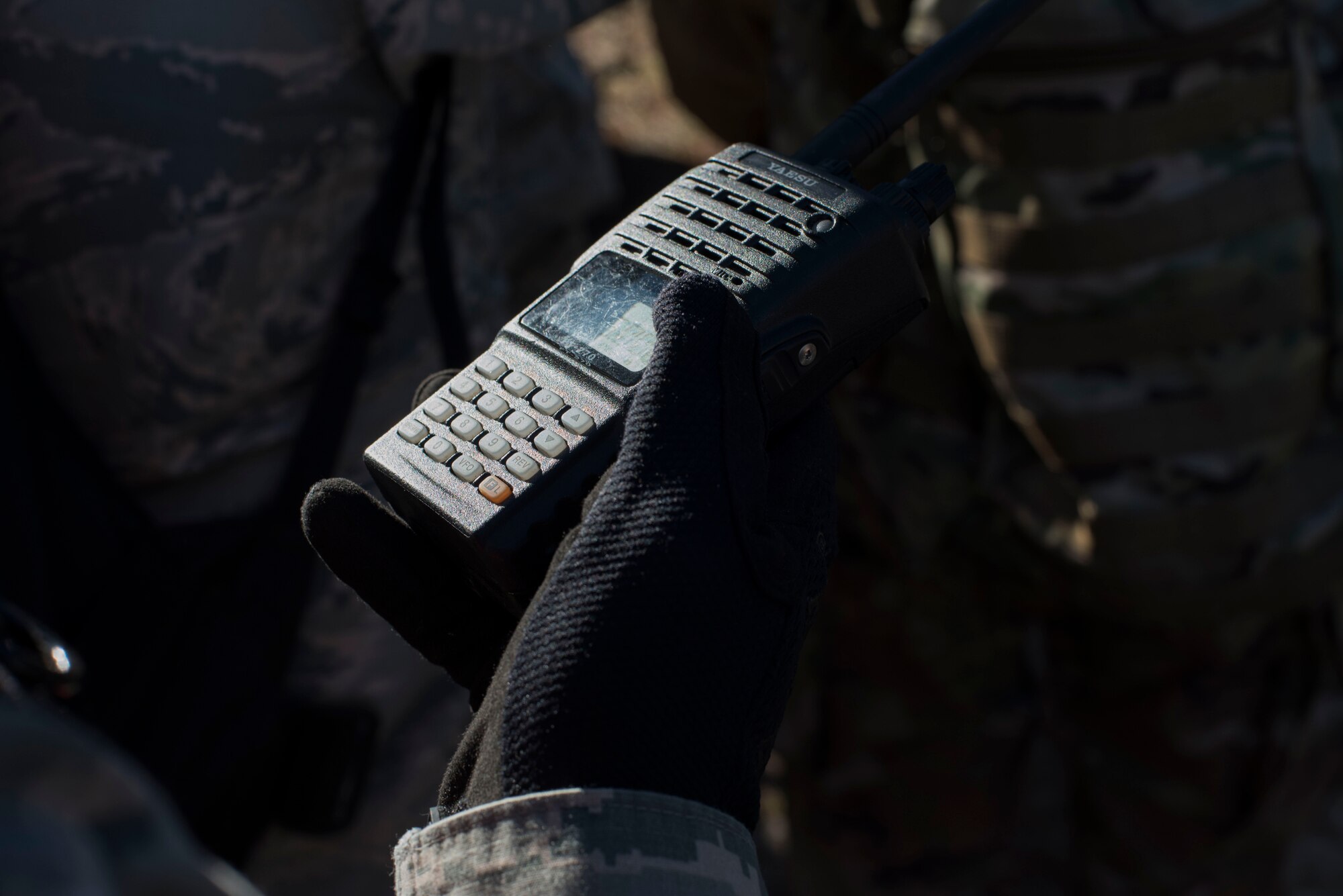 Members of the 820th Base Defense Group sync radio channels before starting counter-improvised explosive device (IED) training, Jan. 24, 2018, at Moody Air Force Base, Ga. The 820th BDG defenders trained on how to detect IEDs and countermeasures to take when one is found. IEDs have become one of the most common forms of attack in the Middle East since 2003. (U.S. Air Force photos by Staff Sgt. Eric Summers Jr.)