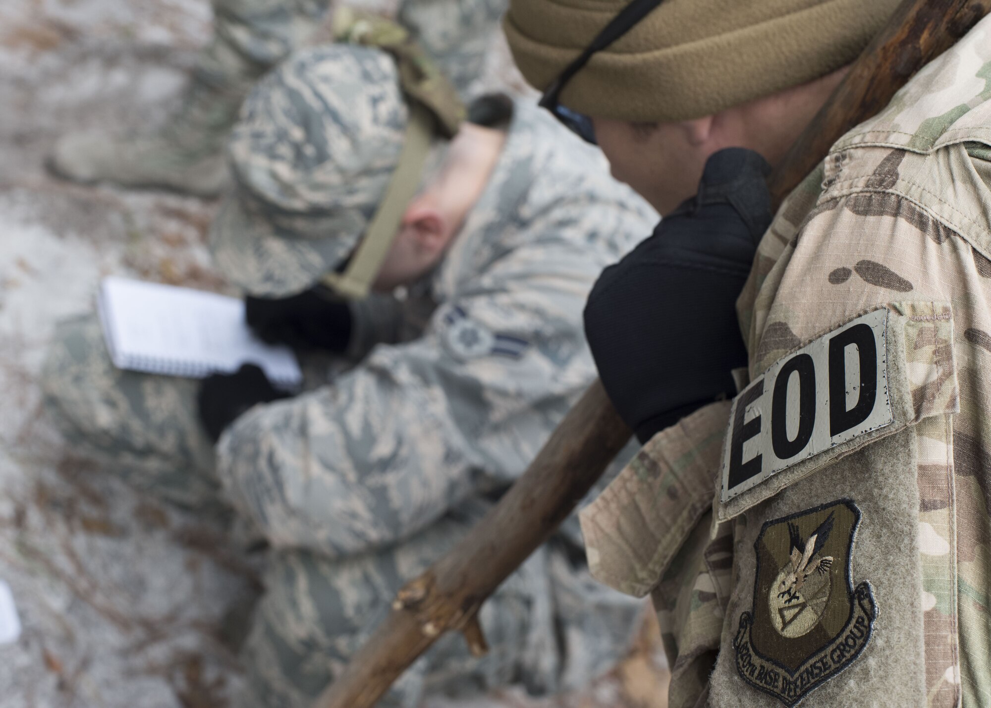 An explosive ordnance disposal technician from the 820th Combat Operations Squadron reviews nine-line notes taken during counter-improvised explosive device training, Jan. 24, 2018, at Moody Air Force Base, Ga. The 820th Base Defense Group defenders trained on how to detect IEDs and counter measures to take when one is found. IEDs have become one of the most common forms of attack in the Middle East since 2003. (U.S. Air Force photos by Staff Sgt. Eric Summers Jr.)