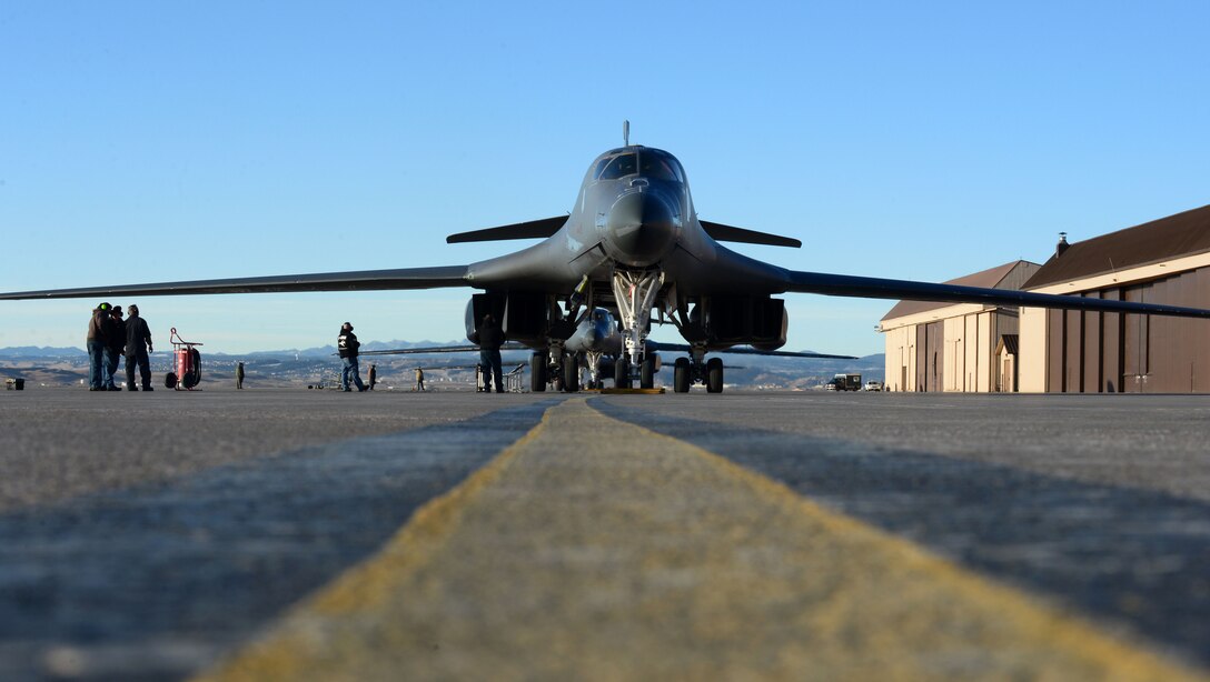 A B-1 bomber assigned to the 37th Bomb Squadron is checked over by maintenance personnel at Ellsworth Air Force Base, S.D., Jan. 24, 2018. B-1 bombers from the 37th BS were deployed to Andersen AFB, Guam, to take part in the Continuous Bomber Presence mission. (U.S. Air Force photo by Airman 1st Class Donald Knechtel)